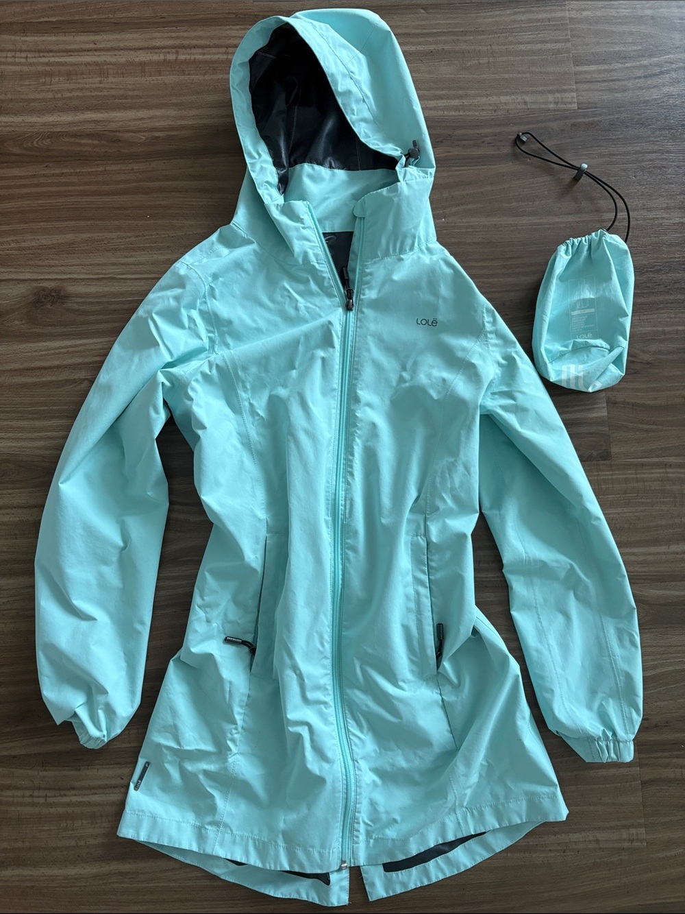 Lolë Women's Light Aqua Packable Rain Jacket